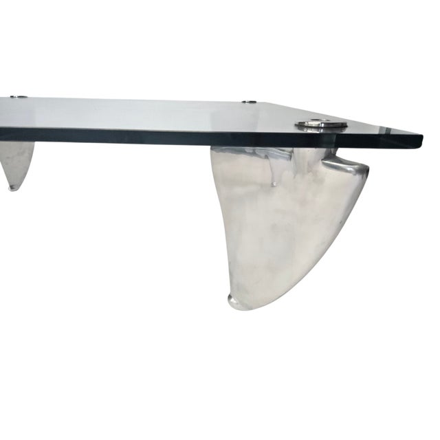 This is one of Hilton’s most iconic pieces of design, the legs are cast from aluminium and support the tempered glass top....