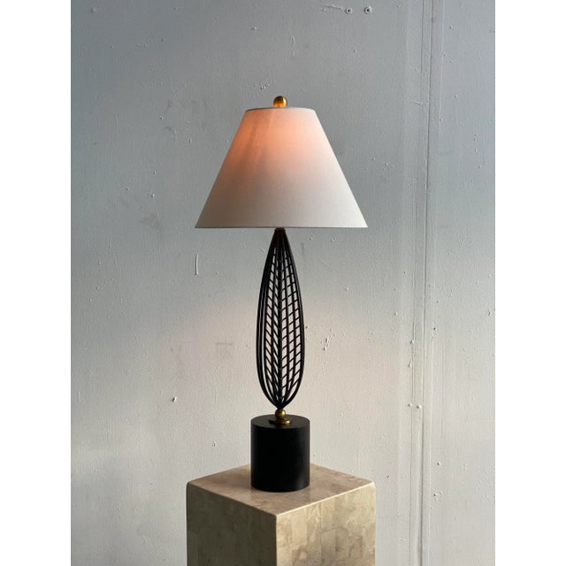 Vintage Monumental Black Enameled Steel Table Lamp Attributed to Laurel Lamp Co., Circa 1950s. Elongated, graphic and...