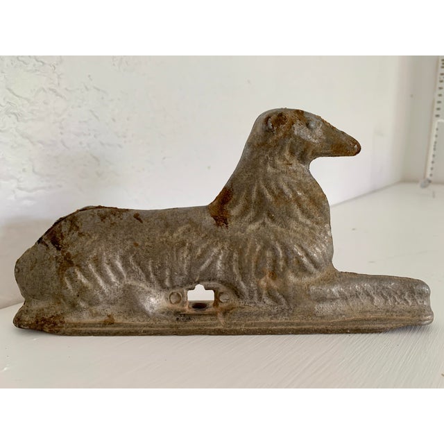 A vintage cast aluminum ornamental fence post topper in the shape of a border collie. These fence toppers were...