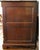 Circa 1765-80 George III period mule chest, English. Oak. Lift top over front of four floating raised panels, flanked by...