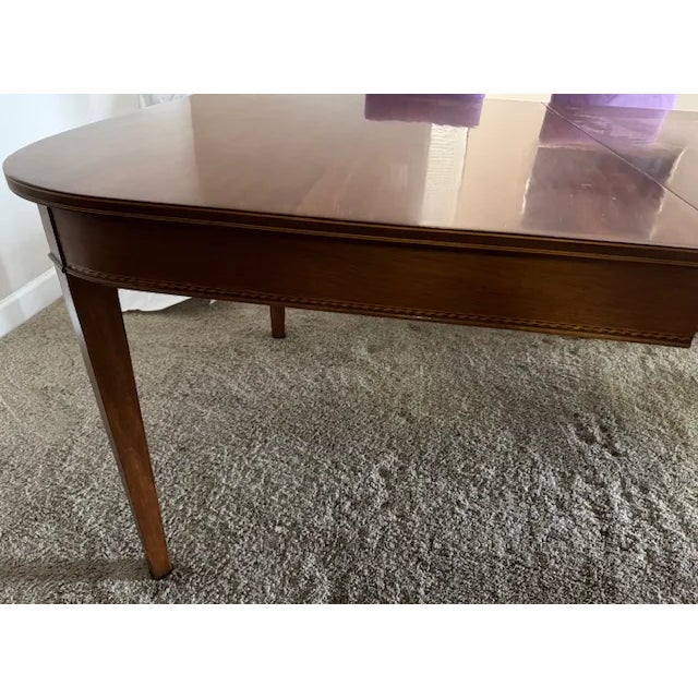 Exquisite Antique Mahogany Table made by the Potthast Furniture Company. The company existed from 1892-1975, known as the...