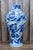 A striking large Chinese blue and white porcelain vase, standing an impressive 49 cm high and displaying the timeless...