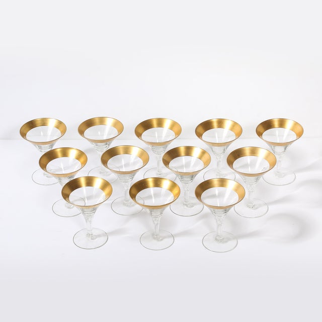 This set of 12 Mid-Century Modernist gilt-rimmed martini glasses, designed by the iconic American glassware designer...