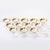 This set of 12 Mid-Century Modernist gilt-rimmed martini glasses, designed by the iconic American glassware designer...