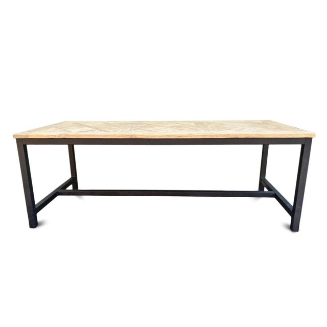 Beautiful vintage hand crafted salvaged raw elm wood in attractive parquet pattern top. Classic black iron simple leg...