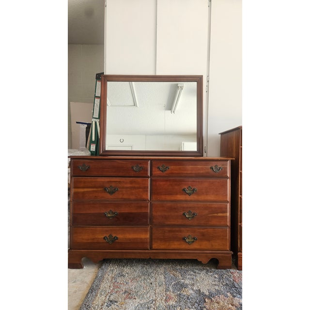 Genuine American made Kincaid solid wood, not particleboard!!! The set includes an eight drawer dresser with a heavy solid...