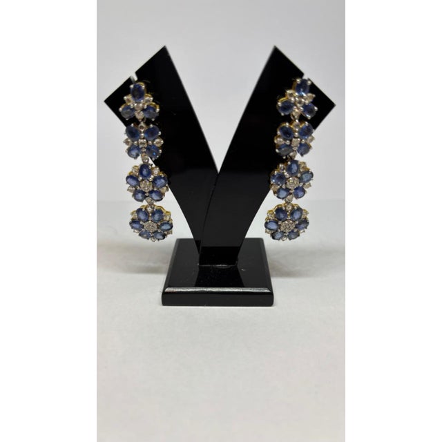 Gemstone details Diamond weight: 2.21 cts Blue sapphire weight: 17.15 cts 14K gold Gross weight: 19.84 grams Gold weight:...
