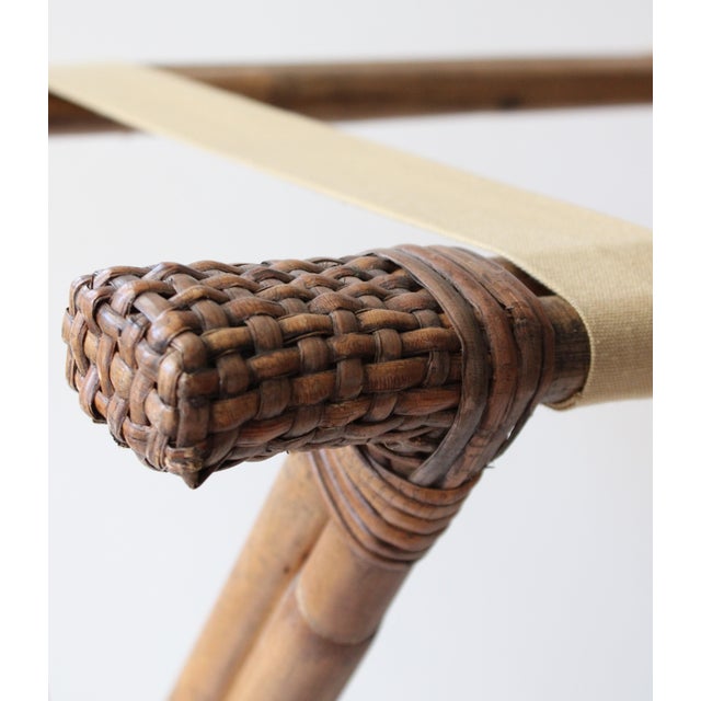Rattan Luggage Rack with a organic bamboo frame, and woven rattan details throughout. Shown in desirable Natural finish,...