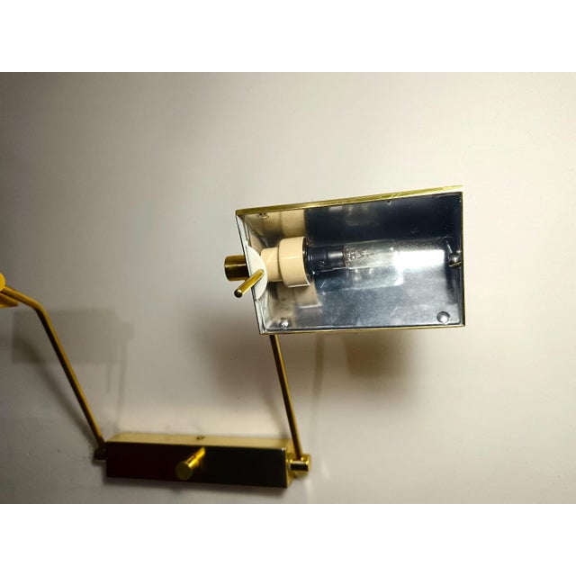 Available two pieces. a superb and most stylish double sconce attributed to "luci milano-italy", rarest "leonardo"...