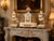 An exceptional 1855–1860 French Louis XVI-style marble and ormolu bronze clock set, consisting of one mantel clock and two...