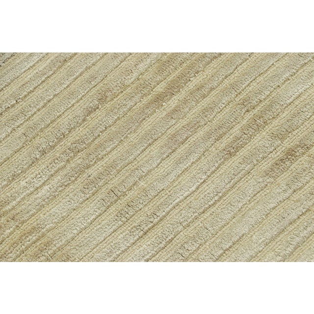 Made with hand-knotted wool and silk, this 3x4 contemporary rug is an exciting addition to the Textural rug collection by...