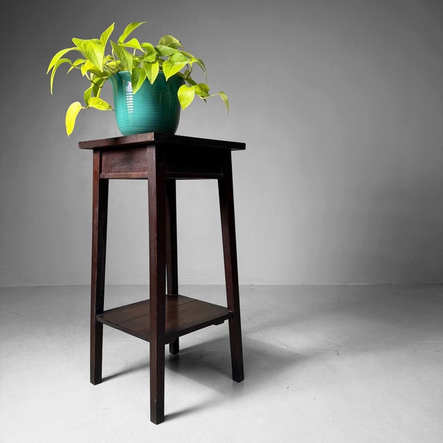 Elegant vintage plant stand from Japan with a slim, linear silhouette and two tiers. Dimensions: height 77 cm, width 36...