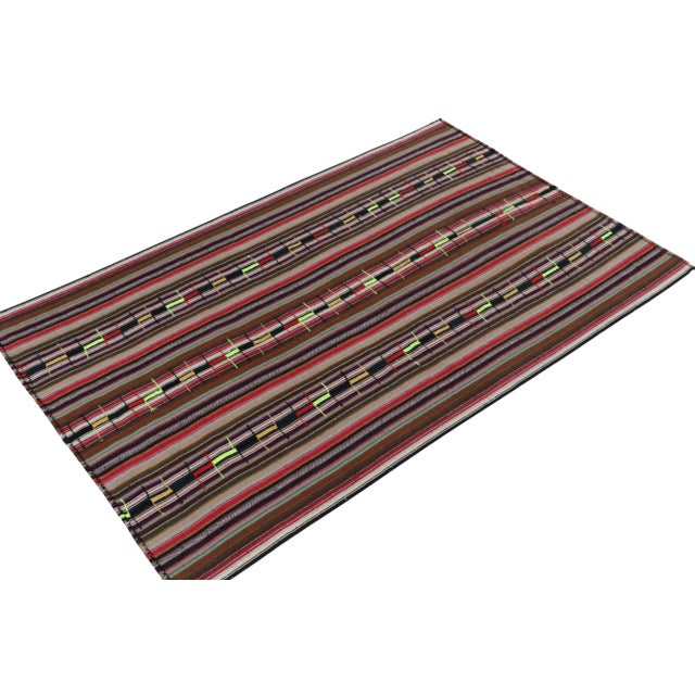 Originating from Turkey circa 1950-1960, a rare type of chaput kilim rug style now entering our Antique & Vintage...