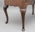 18th Century walnut and feather banded side table / lowboy, the moulded edge top crossbanded and decorated with feather...
