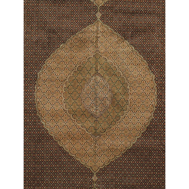 Very fine hand-knotted Persian Tabriz rug featuring an allover Mahi (Herati) design with a large scalloped central...