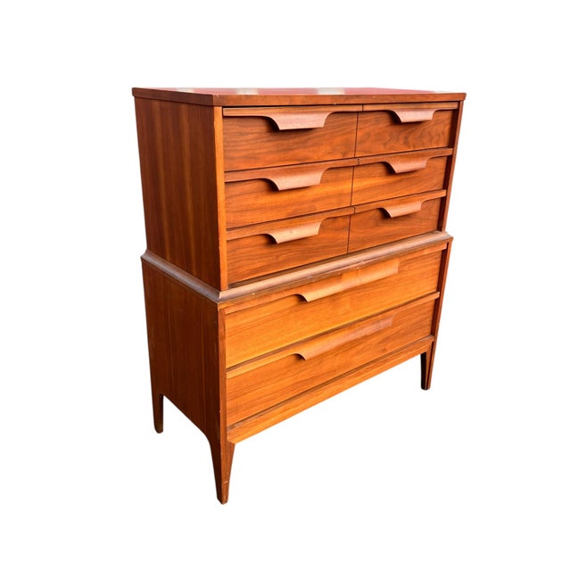 Johnson-Carper Mid-Century Modern Walnut Highboy Dresser A beautifully designed mid-century modern highboy dresser by...