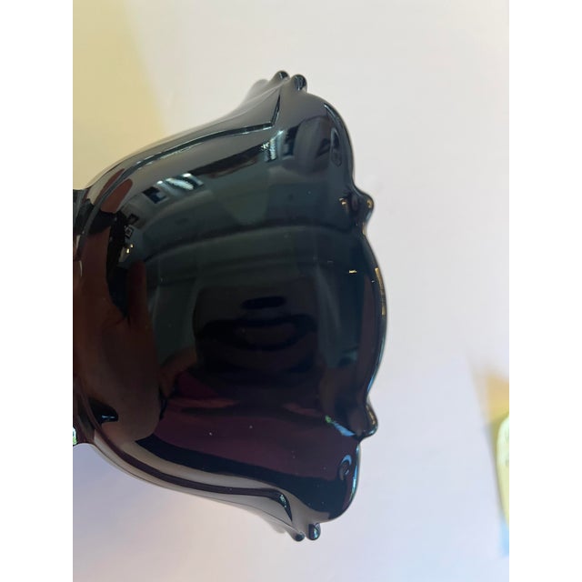 Add dramatic vintage elegance to your home with this beautiful Black Amethyst three-footed art glass bowl, attributed to...