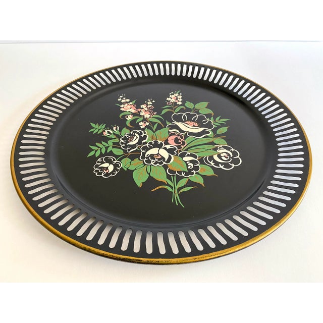 This rare vintage 1950's floral lithograph print extra large round metal decorative serving tray is a very special and...