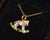 This authentic Aaron Basha Rocking Horse charm is crafted in solid 18K yellow gold and accented with colorful pastel pink...
