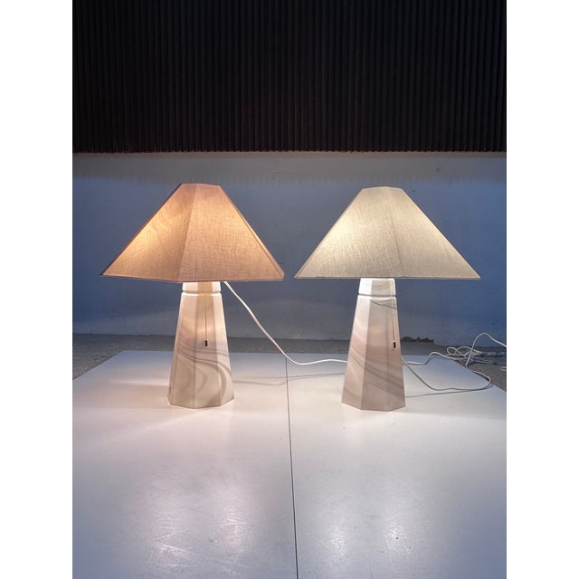 A pair of exceptional table lamps from the carrara arte colore series by the renowned german glassworks peill & putzler,...
