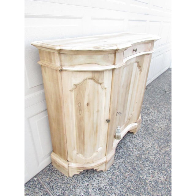 Antique Italian bleached out and weathered credenza, c.1900 A well proportioned small scale serpentine fronted credenza....