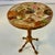 This is a stunning Americana Folk Art Boho Chic Pedestal Drinks Table. It's crafted from slices of semi-precious stones...