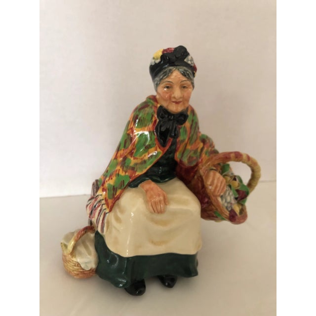 Very rare to find in this condition , Royal Doulton “The Old Lavender Seller”. # HN1492 Designed by Leslie Harradine,...
