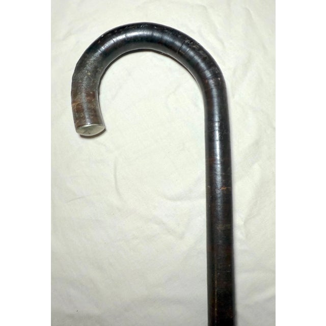 This antique walking stick cane from the 19th century is a unique addition to your collection. Handmade and crafted with...