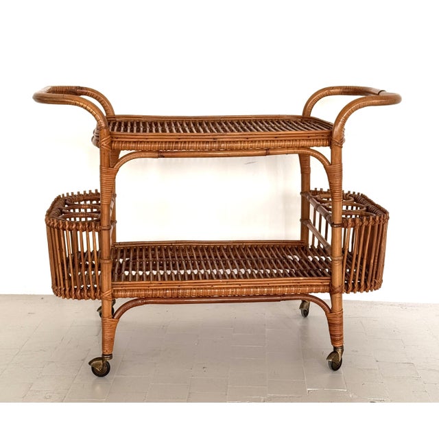 Italian Bamboo Bar Cart or Trolley, 1960s Italian Bamboo and Rattan Bar Cart Trolley with curved pockets for bottles and...