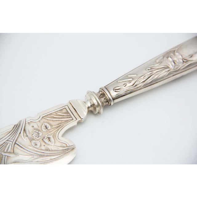 Silver Fish Knife with Reliefs, in Very Good conditions. Designed before 1890 This piece has an attribution mark, I am...