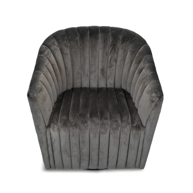 Classic slate grey velvet polyester upholstered swivel chair. Modern minimalist style with channel tufting for added...