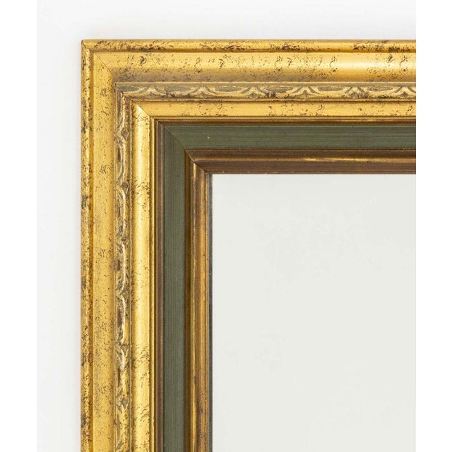 Green Painted and Giltwood Framed Mirror. Mirror plate: 35" H x 23" W; frame: 34" H x 31.5" W x 1.5" D. Provenance: From a...