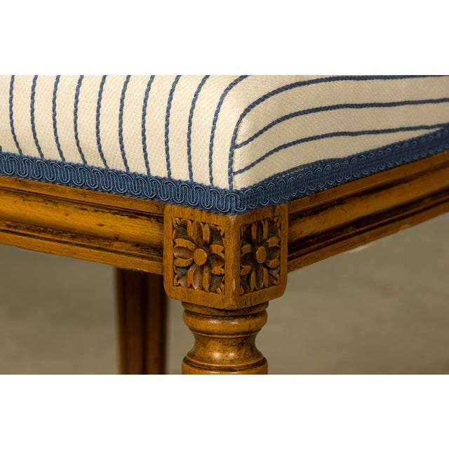 Sourced in Provence, France, this set of eight late 19th century Louis XVI style dining chairs showcases the refined...