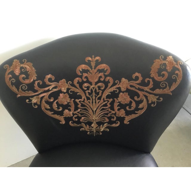 Low seat black leather chair with embroidery and hand painted Chinoiserie gold details with antique gold nail heads. This...