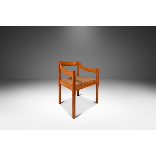 Add a touch of Italian mid-century modern elegance to your dining space with this set of two Model 892 chairs, attributed...