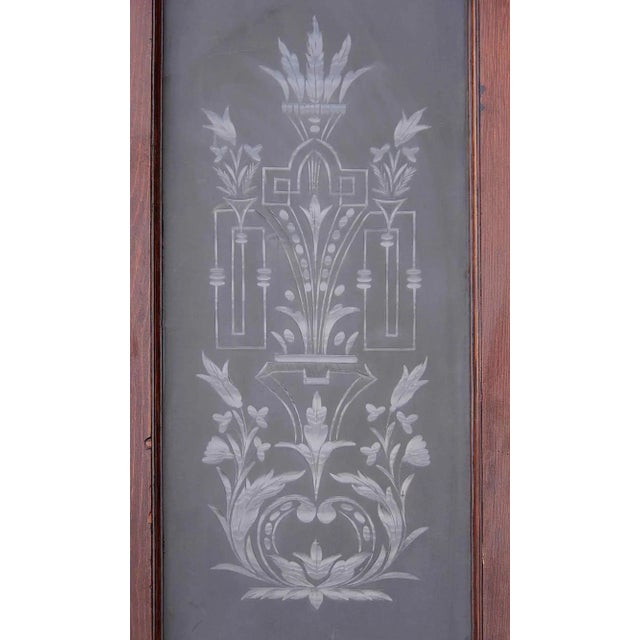 Pair of antique vestibule entry doors arched top having cut and frosted glass panels. Circa:1870. Please note:Left panel...