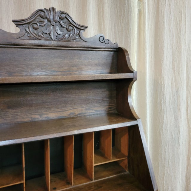 This English carved oak bureau secreatire bookcase is a good size for a small space. It's a decorative piece that also is...