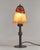 Daum A wonderful 1925-30 French art deco lamp in wrought iron of excellent quality. The forged base holds a nice coloured...