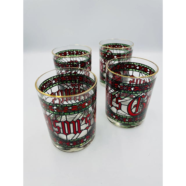 This cozy Set of Four mid-century Houze Lowball Glasses are signed and feature a lovely stained glass style motif of...