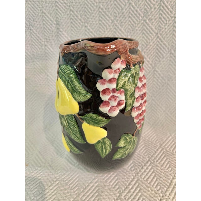 Fitz and Floyd is classic tableware and never disappoints. This black glazed pitcher is majolica in style and features...