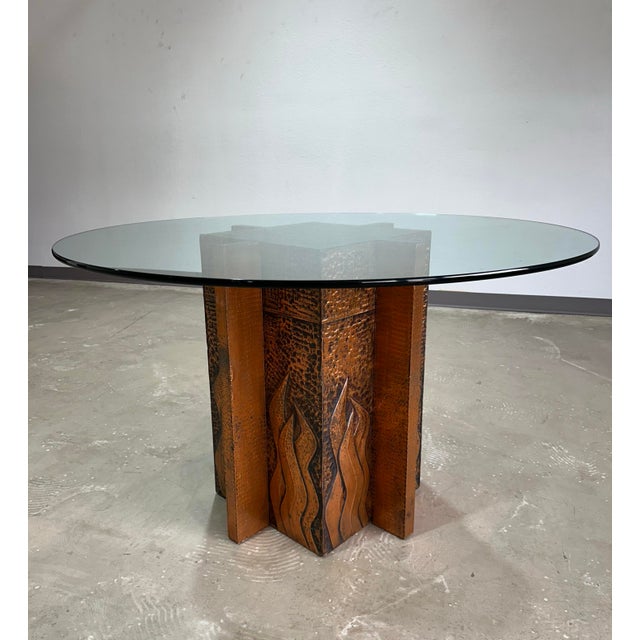 Vintage Hammered Copper Pedestal Dining Table with Glass Top in the style of Paul Evans. Maker unknown, hammered and...