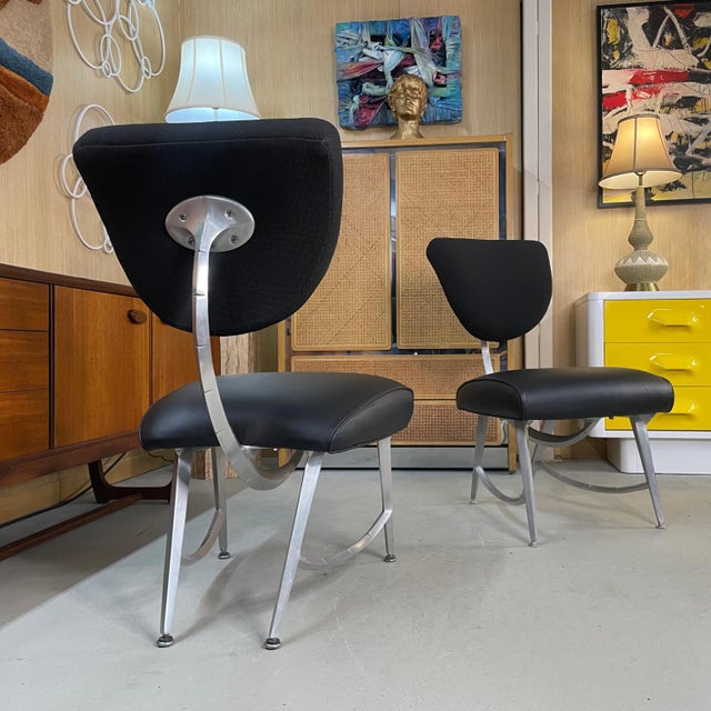 Sold as a pair. Price shown is for two chairs. Created for Chicago’s Disney Quest in 1995, these “Armillary Chair” is a...