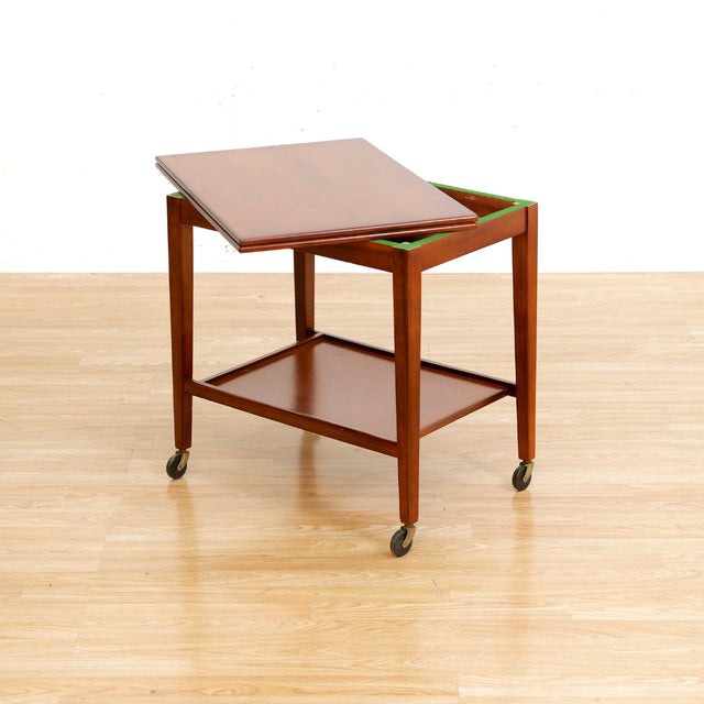Mid-century folding bar cart made in by Eastcraft of Scotland during the 1950s. A striking little cart with a folding top...