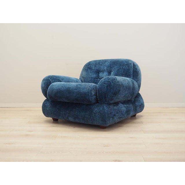 The armchair was made in the 1970s, Italian production. It is covered with original, high-quality blue fabric. We also...