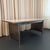 This sleek, industrial, brushed steel police station desk circa the 1950s is a handsome example of streamlined Mid-Century...