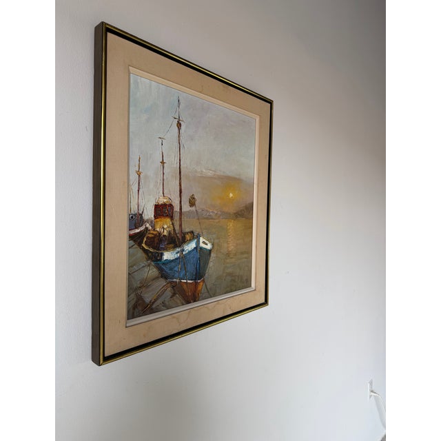 Beautiful 1970s vintage oil on canvas painting depicting a tranquil harbor scene at sunset. The composition features a...