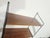 This unique, incredibly stylish wall shelf consists of three wooden shelves finished with a beautiful, warm natural veneer...