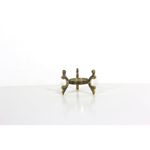 Three available at time of listing. Vintage brass egg pedestal or base, could hold anything small. There are three scroll...