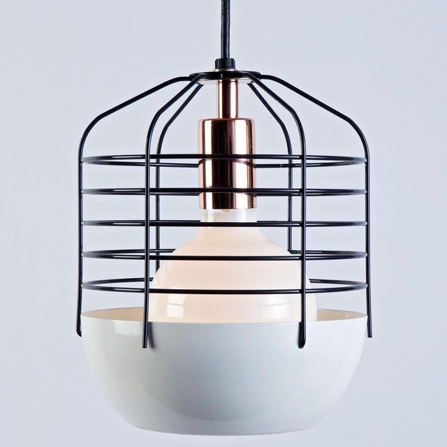 The Roll & Hill Bluff City 8" Pendant Light by Jonah Takagi combines a traditional pendant shade with a wire cage,...
