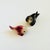 A pair of vintage ceramic salt and pepper shakers in the shape of fish, each with a removable cork stopper. Made in Japan....